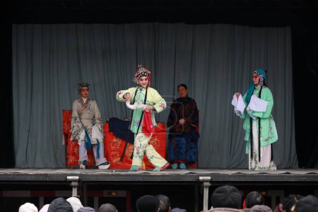 Photo for Luannan county - Feb 28, 2018: Chinese traditional costume drama performance on stage, luannan county, hebei province, China - Royalty Free Image