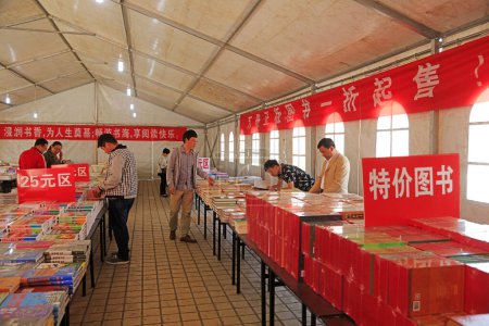 Photo for Luannan County - May 4, 2018: readers choose books in the bookstore, Luannan, Hebei, Chin - Royalty Free Image