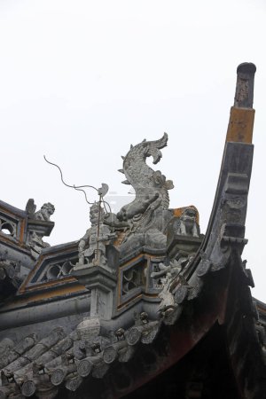 Photo for Exquisite sculptures on eaves, Chenxiang Pavilion, Shanghai, China - Royalty Free Image