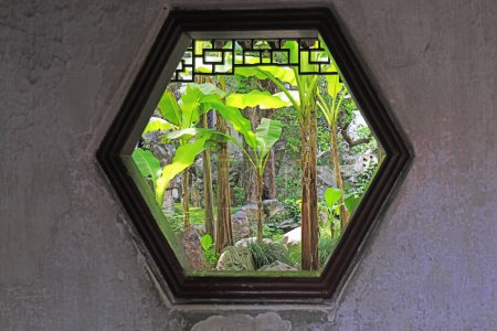 Photo for The banana seen through the hole is in Yu Garden. - Royalty Free Image
