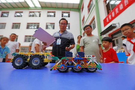 Photo for LUANNAN COUNTY, China - July 20, 2018: The car made by students hit the scene of the competition, LUANNAN COUNTY, Hebei Province, China - Royalty Free Image