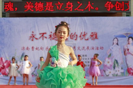 Photo for Luannan County - August 27, 2018: Children model shows in Luannan County, Hebei Province, Chin - Royalty Free Image