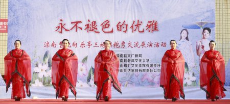 Photo for Luannan County - August 27, 2018: cheongsam walking show, in Luannan County, Hebei Province, Chin - Royalty Free Image