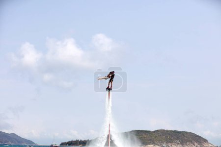 Photo for Sanya City, China - April 1, 2019: Water flying man amusement project in Yalong Bay, Sanya City, Hainan Province, China - Royalty Free Image