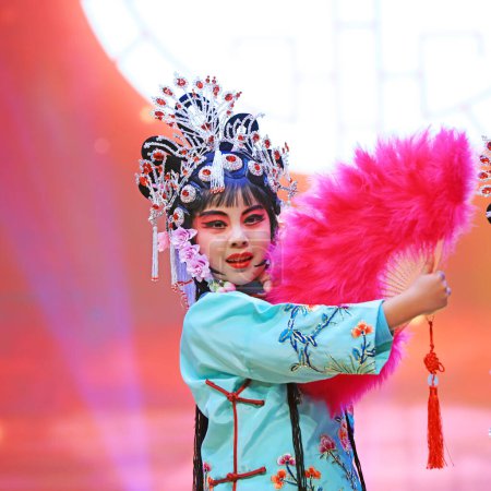 Photo for Luannan County - January 27, 2019: Children Peking Opera Performance on the Stage, Luannan County, Hebei Province, China - Royalty Free Image