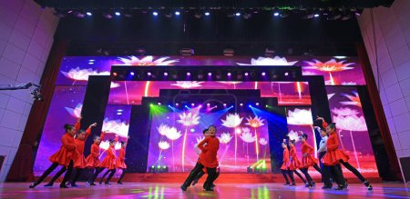 Photo for Luannan County - January 27, 2019:  children latin dance performance on the stage, Luannan County, Hebei Province, China - Royalty Free Image