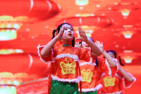 Photo for Luannan County - January 29, 2019: Children's Dance Performance on the Stage, Luannan County, Hebei Province, China - Royalty Free Image
