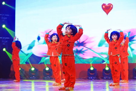 Photo for Luannan County - January 29, 2019: children dance performance on the Stage, Luannan County, Hebei Province, China - Royalty Free Image