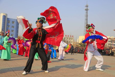 Photo for Luannan County - March 2, 2018: Yangge Dance Performance on the square, Luannan County, Hebei Province, China - Royalty Free Image