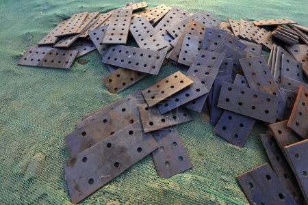 Photo for Steel plates with holes stacked togethe - Royalty Free Image