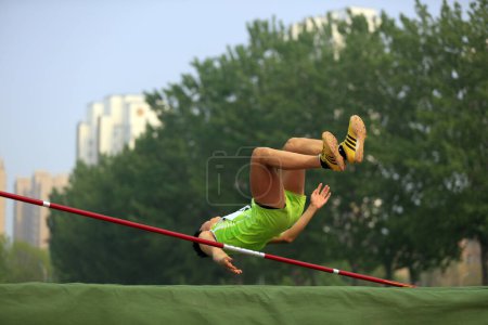 Photo for High jumpers at the scene of the gam - Royalty Free Image