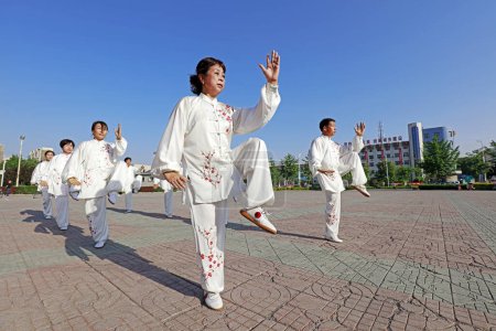 Photo for Luannan County - May 19, 2018: Chinese Taijiquan performance is on the square, Luannan County, Hebei Province, Chin - Royalty Free Image
