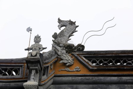 Photo for Exquisite sculptures on eaves, Chenxiang Pavilion, Shanghai, China - Royalty Free Image