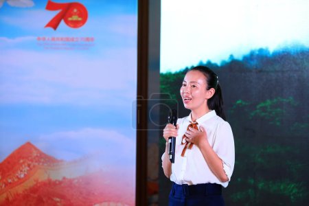 Photo for Luannan County, China - July 4, 2019: A contestant was at the Speech Competition of "Me and My Motherland", Luannan County, Hebei Province, China. - Royalty Free Image