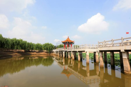 Photo for Chinese Classical Traditional Architecture in Artificial Lake - Royalty Free Image