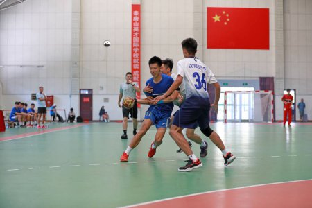 Photo for Luannan County, China - August 24, 2019: Junior Handball Matches in the Gymnasium, Luannan County, Hebei Province, China - Royalty Free Image
