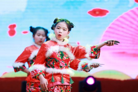 Photo for LUANNAN COUNTY, Hebei Province, China - January 1, 2020: Chinese children's dance performance on stage. - Royalty Free Image
