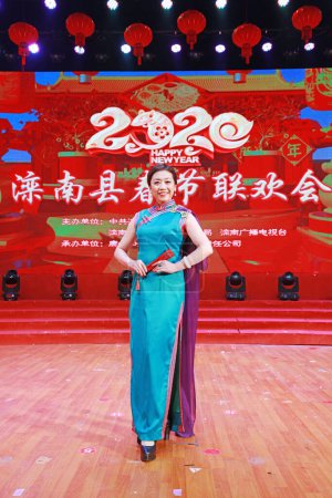Photo for LUANNAN COUNTY, Hebei Province, China - January 13, 2020: Chinese traditional cheongsam show on stage. - Royalty Free Image