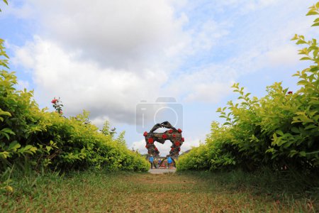 Photo for Sanya City, China - April 1, 2019: Love sculpture architectural landscape in a park, Sanya City, Hainan Province, China - Royalty Free Image