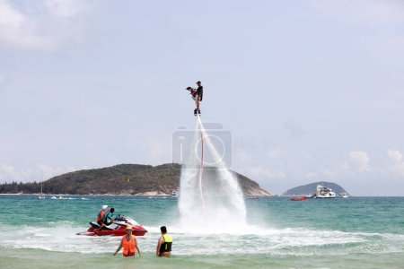 Photo for Sanya City, China - April 1, 2019: Water flying man amusement project in Yalong Bay, Sanya City, Hainan Province, China - Royalty Free Image