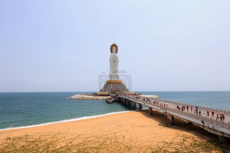 Photo for Sanya City, China - April 2, 2019: Guanyin sculpture on the sea in Nanshan tourist area, Sanya City, Hainan Province, China - Royalty Free Image