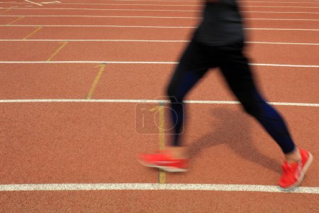 Photo for Long distance runners are running on the track - Royalty Free Image