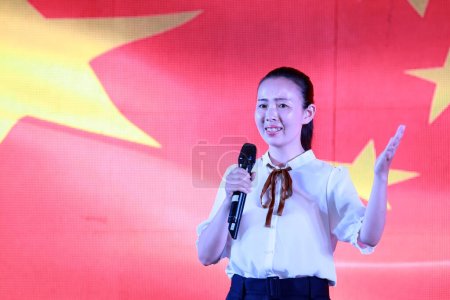 Photo for Luannan County, China - July 4, 2019: A contestant was at the Speech Competition of "Me and My Motherland", Luannan County, Hebei Province, China. - Royalty Free Image
