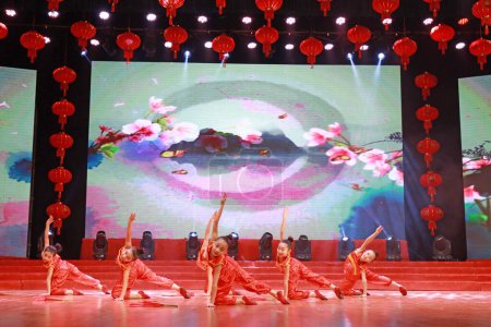Photo for LUANNAN COUNTY, Hebei Province, China - January 11, 2020: Chinese children's dance performance on stage. - Royalty Free Image
