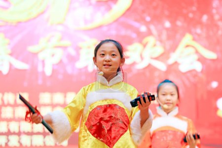 Photo for Luannan County - January 24, 2019: Performance of literary and artistic programs on stage, Spring Festival Gala, Luannan County, Hebei Province, China - Royalty Free Image