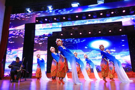 Photo for Luannan County - January 24, 2019: Inner Mongolia Style Dance Performance on stage, Spring Festival Gala, Luannan County, Hebei Province, China - Royalty Free Image