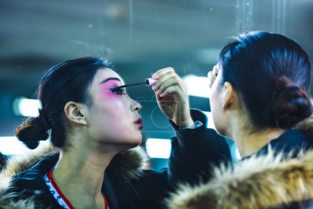 Photo for Luannan County - January 25, 2019: Beijing Opera actresses are putting on makeup, Luannan County, Hebei Province, China - Royalty Free Image