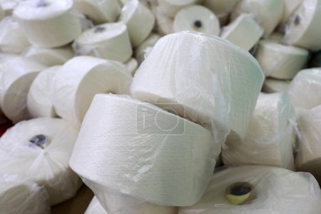 Photo for Cotton yarn piled up waiting to be packed in a spinning mill - Royalty Free Image