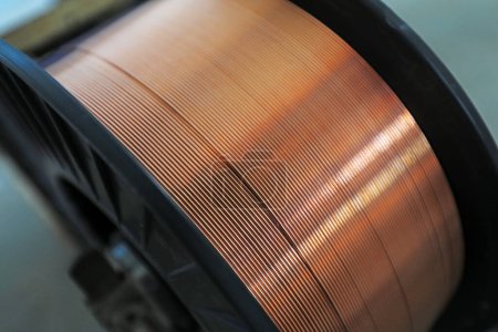 Photo for Rolled red copper wire, close-up photo - Royalty Free Image