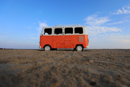 Photo for The red bus model is on the beach at a scenic spot - Royalty Free Image