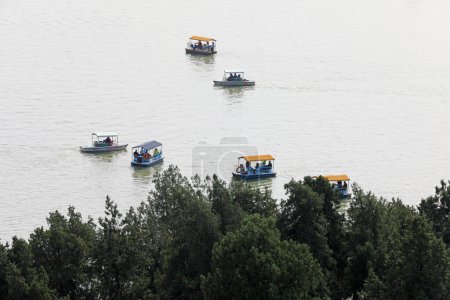 Photo for A cruise ship runs in Kunming Lake of the summer palace, Beijing, China - Royalty Free Image