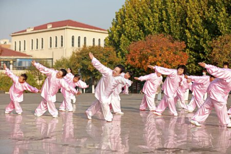 Photo for LUANNAN COUNTY, Hebei Province, China - October 18, 2020: People practice Taijiquan in the park - Royalty Free Image