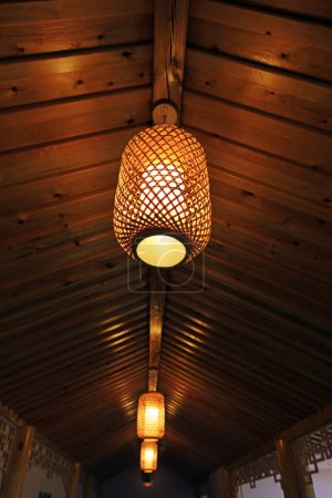 Photo for Bamboo lanterns on wooden roofs - Royalty Free Image