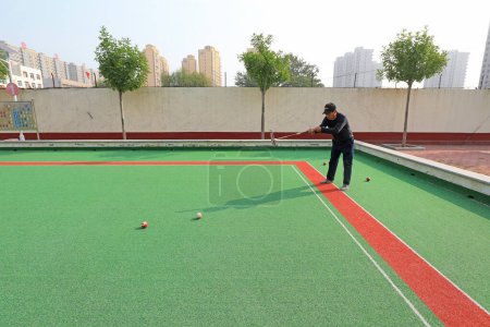 Photo for LUANNAN COUNTY, China - October 20, 2020: Chinese gateball enthusiasts are playing Chinese gateball, LUANNAN COUNTY, Hebei Province, China - Royalty Free Image