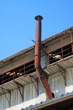 Industrial buildings and chimneys, closeup of photo