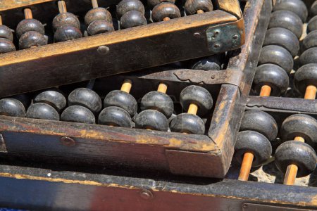 ancient chinese calculator - calculations, closeup of photo