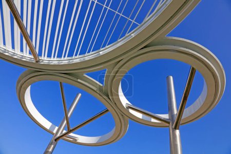 Stainless steel ring landscape architecture under blue sky