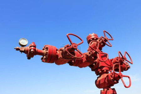 Rotes Öl-Pipeline-Ventil, Nahaufnahme von phot