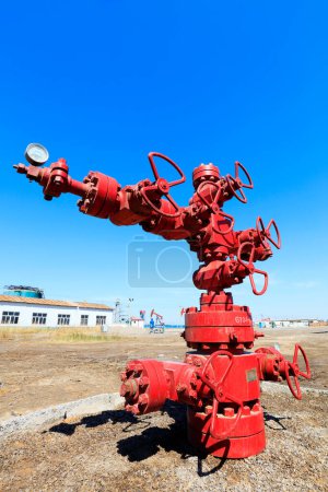 red oil pipeline valve, closeup of phot