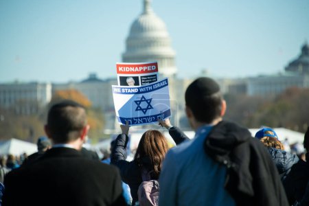 Photo for A participant holds at sign at the March for Israel in Washington DC, USA on November 14, 2023 - Royalty Free Image