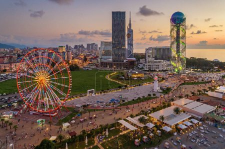 Photo for Aerial view of Batumi, Georgia. The Ferris Wheel and the Alphabet Tower are in the foreground. - Royalty Free Image