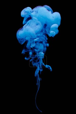 Photo for Blue ink swirling in water isolated on black background - Royalty Free Image