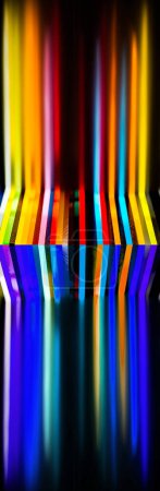 Photo for Light through Stack of different colours Cast Acrylic Sheet on black background - Royalty Free Image
