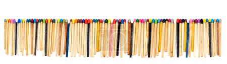 Photo for Multicolored matchsticks on white paper - Royalty Free Image