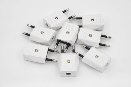 Photo for White power plugs on white background - Royalty Free Image
