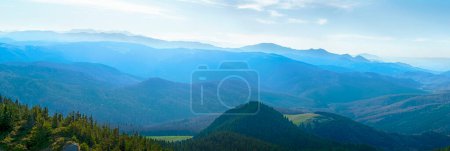 Photo for Hazy sun over the mountains peaks, Bratocea pass, Ciucas mountains, Brasov county, Romania, 1720m - Royalty Free Image